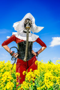 The Red Nun - A gasmasked trip into a colorfull canola field